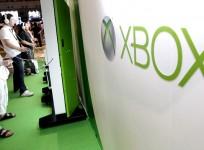 visitors-play-with-microsoft039s-xbox-360-consoles-at-the-tokyo-game-show-in-chiba