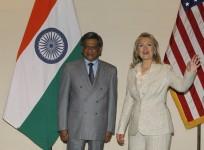 u-s-secretary-of-state-clinton-gestures-as-indias-foreign-minister-krishna-watches-during-photo-opportunity-ahead-of-their-meeting-in-new-delhi
