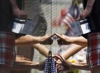 people-touch-the-vietnam-veterans-memorial-wall