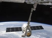 the-spacex-dragon-commercial-cargo-craft-is-seen-as-it-is-grappled-by-the-international-space-stations-canadarm2-reuters-nasa