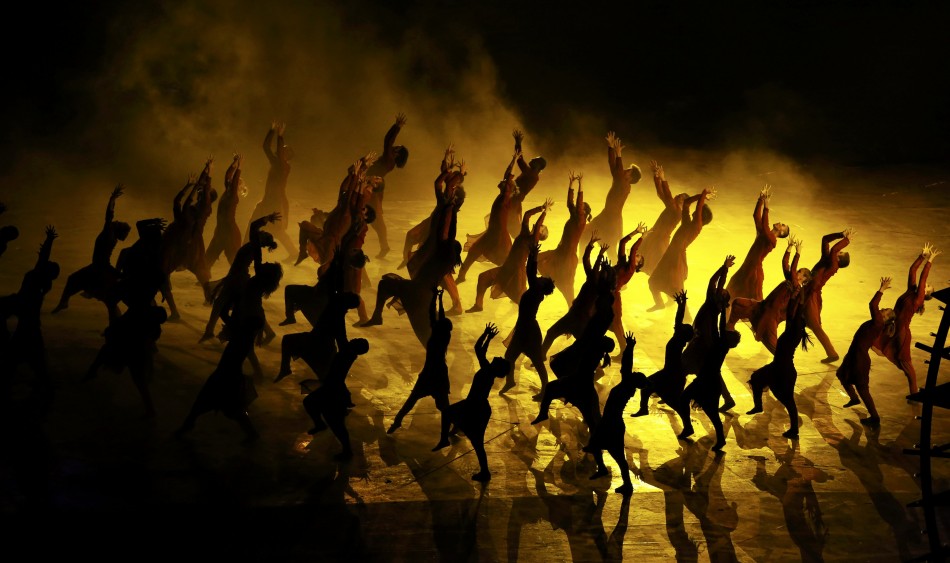 Performers take part in the opening ceremony of the London 2012 Olympic Games. London 2012 Olympic