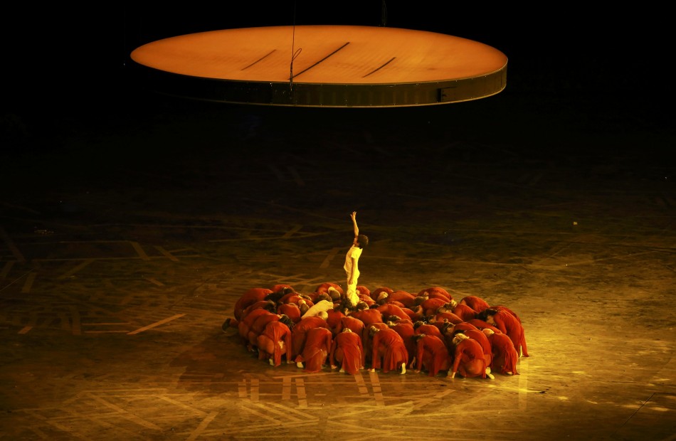 Performers take part in the opening ceremony of the London 2012 Olympic Games. London 2012 Olympic
