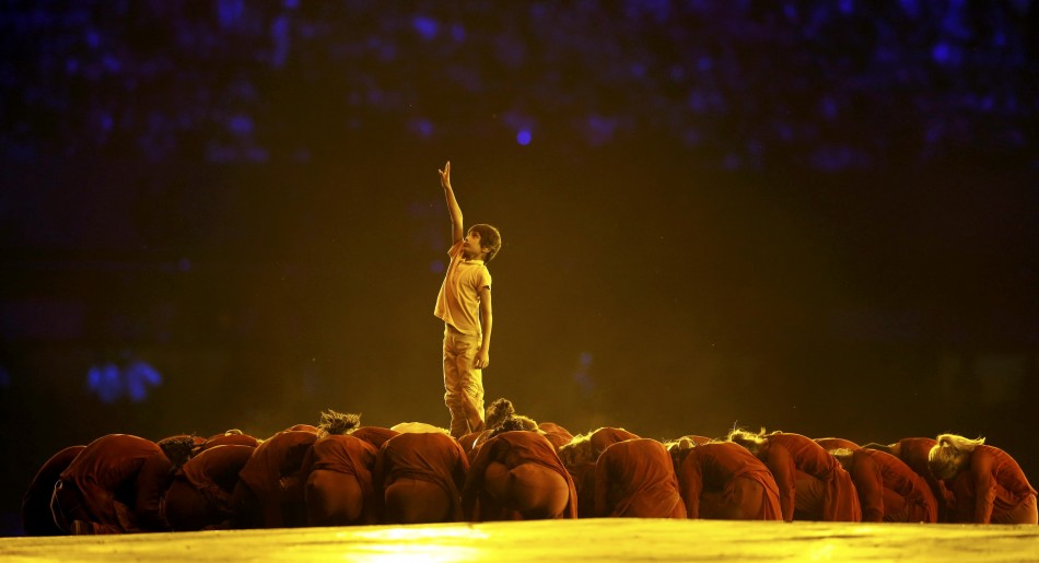 Performers take part in the opening ceremony of the London 2012 Olympic Games. London 2012 Olympic