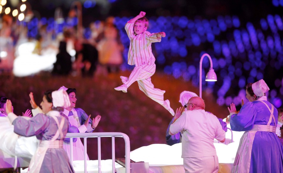Performers take part in the opening ceremony of the London 2012 Olympic Games. London 2012 Olympic