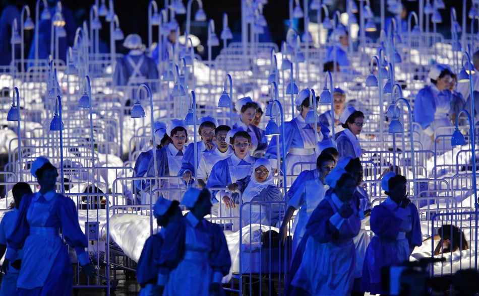 Performers take part in the opening ceremony of the London 2012 Olympic Games. London 2012 Olympic