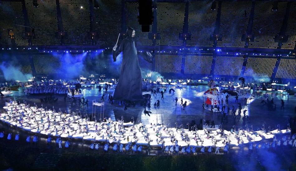 Performers take part in the opening ceremony of the London 2012 Olympic Games. London 2012 Olympic