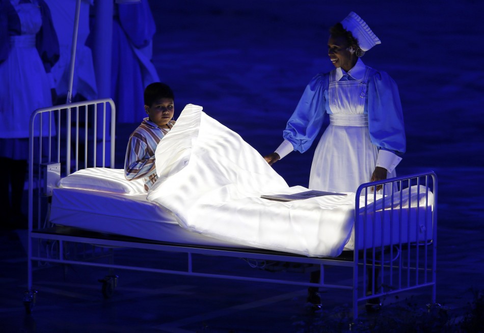 Performers take part in the opening ceremony of the London 2012 Olympic Games. London 2012 Olympic