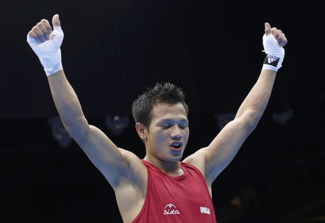 India's Singh Laishram reacts after he defeated Mongolia's Purevdorj in their Men's Light Fly (49kg) Round of 16 boxing match during the London 2012 Olympic Games Laishram Devendro Singh