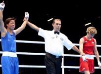 mary-kom-of-india-celebrates-her-victory-karolina-michalczuk-of-poland-during-the-womens-fly-48-51kg-boxing-on-day-9
