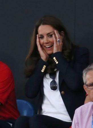 Britain's Catherine, Duchess of Cambridge reacts as she attends women's semifinal hockey match between Great Britain and Argentina at Riverbank Arena at London 2012 Olympic Games Kate Middleton
