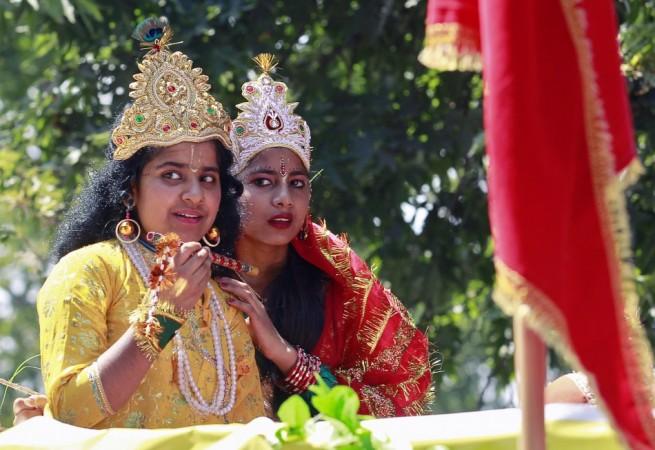 School children dressed as Lord Krishna and Goddess Radha take part in celebrations on eve of Janmashtami in Jammu (Reuters) Janmashtami