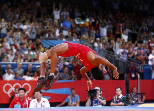 India's Yogeshwar Dutt reacts after defaeting North Korea's Jong Myong Ri for the bronze medal on the Men's 60Kg Freestyle wrestling at the ExCel venue during the London 2012 Olympic Games Yogeshwar Dutt