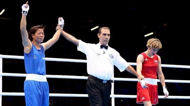Mary Kom of India celebrates her victory Karolina Michalczuk of Poland during the Women's Fly (48-51kg) Boxing on Day 9. Mary Kom of India celebrates her victory Karolina Michalczuk of Poland during the Women's Fly (48-51kg) Boxing on Day 9.