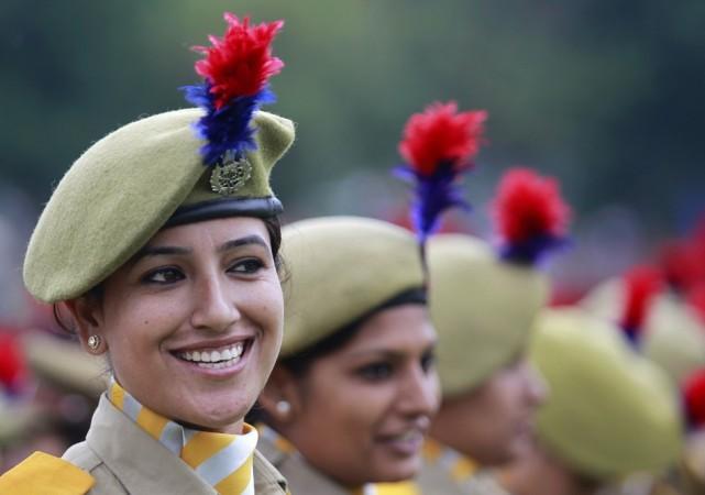 Member of women's police contingent smiles at parade during India's Independence Day celebrations in Srinagar Independence Day