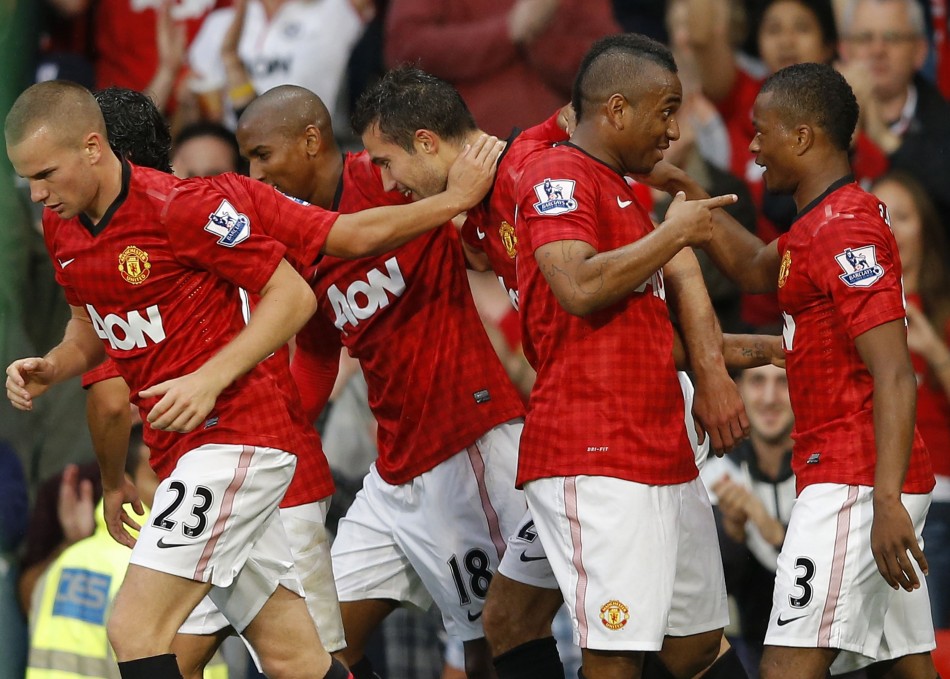 Manchester United's van Persie celebrates his goal against Fulham with team mates during their English Premier League soccer match in Manchester Manchester United, Robin Van Persie