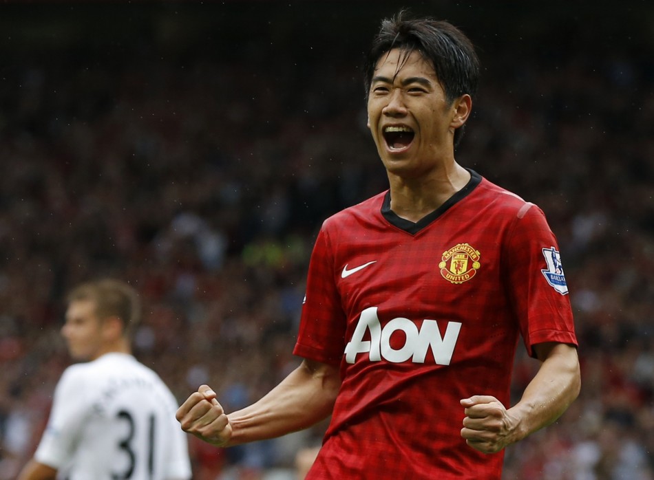 Manchester United's Shinji Kagawa celebrates his goal against Fulham during their English Premier League football match in Manchester Shinji Kagawa