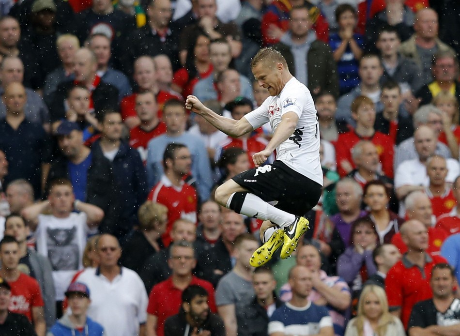 Fulham's Duff celebrates his goal against Manchester United during their English Premier League soccer match in Manchester Fulham, Duff