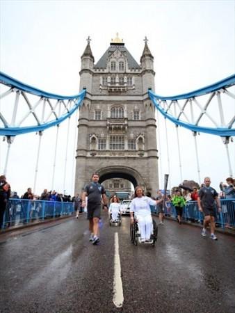 The Paralympic Flame is carried over Tower Bridge on the Torch Relay leg between Tower Hamlets and Southwark. The Paralympic 24-hour Torch Relay