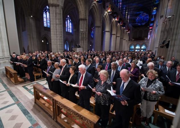 Attendees of the memorial service for Neil Armstrong sing a hymnal, Thursday, Sept. 13, 2012, at the Washington National Cathedral. Image Credit: NASA/Bill Ingalls Armstrong Memorial Service