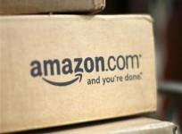 a-box-from-amazon-com-is-pictured-on-the-porch-of-a-house-in-golden-colorado