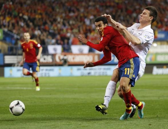 Pedro in action for Spain during the 2014 FIFA World Cup in Brazil Spain, France