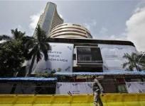 a-man-walks-past-the-bombay-stock-exchange-bse-building-in-mumbai