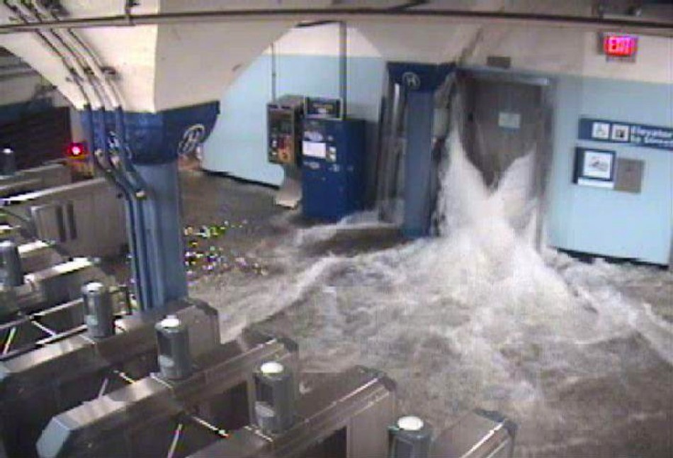 Floodwaters from Hurricane Sandy rush into the Port Authority Trans-Hudson's (PATH) Hoboken, New Jersey station through an elevator shaft Hurricane Sandy