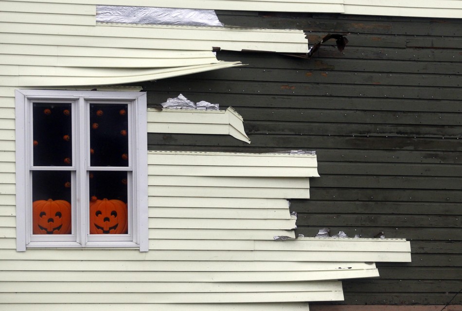 Siding blows off of a house along the coast due to high winds from Hurricane Sandy in Scituate Hurricane Sandy