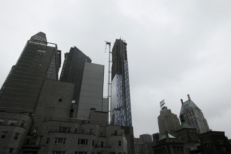 A partially collapsed crane hangs from a high-rise building in Manhattan as Hurricane Sandy makes its approach in New York Hurricane Sandy