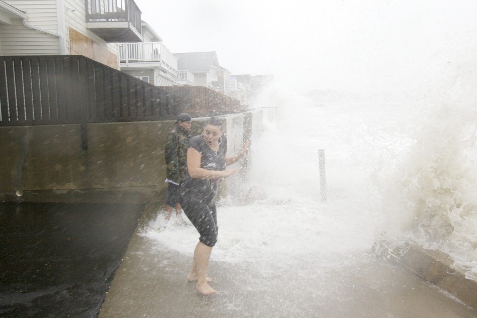 Denitsa Nakova lets the waves wash her in Milford, Connecticut as Hurricane Sandy approaches the area Hurricane Sandy
