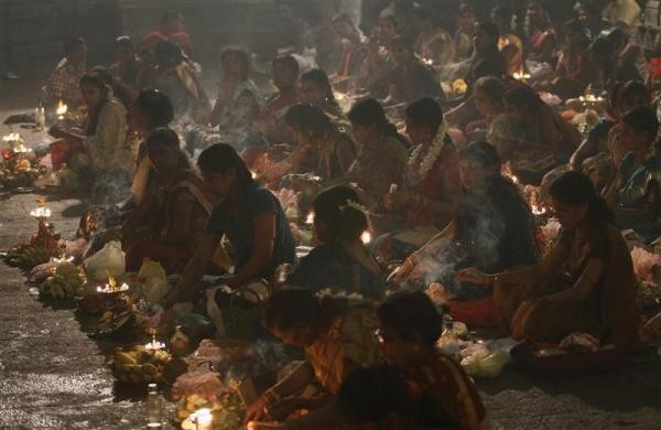Hindu devotees pray during the festival of Diwali at Shivm Kovi temple in Colombo. Diwali Celebrations