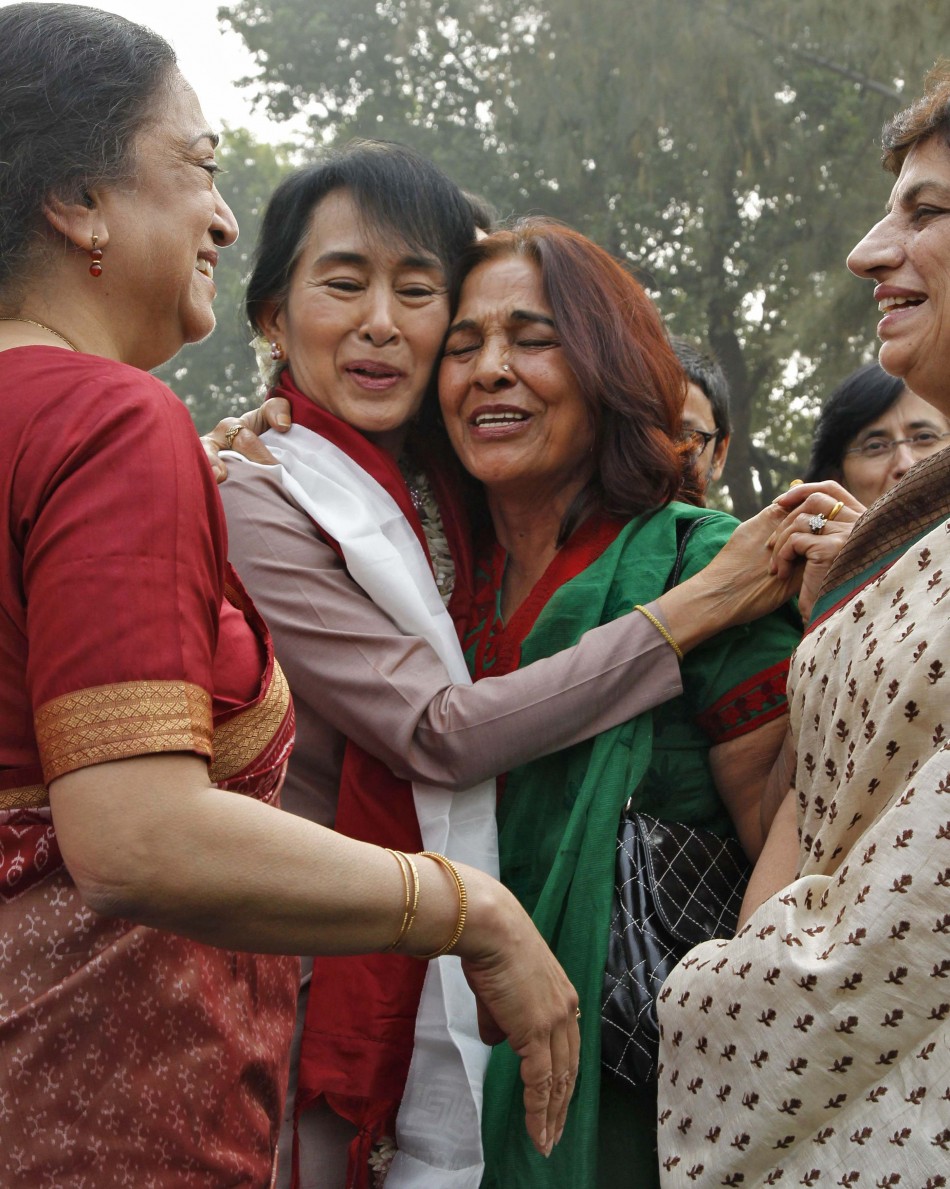 Myanmar's opposition leader Suu Kyi greets faculty members during a visit to her former college Lady Shri Ram in New Delhi.
Aung San Suu Kyi Takes A Walk Down Memory Lane, Feels Herself ‘Partly A Citizen Of India’ (PHOTOS)