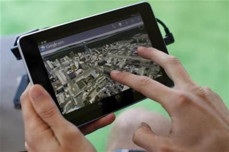 An attendee uses Google Map on a Google Nexus 7 tablet during Google I/O 2012 Conference at Moscone Center in San Francisco, California June 27, 2012. Google Maps