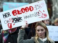 a-woman-holds-a-poster-during-a-vigil-in-dublin-in-memory-of-savita-halappanavar-and-in-support-of-changes-to-abortion-law-the-31-year-olds-family-claimed-that-she-died-after-being-repeatedly-refused-a-termination-during-miscarriage