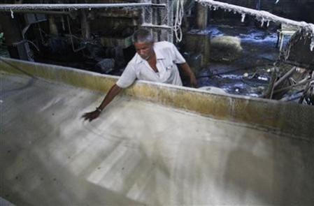 Government to integrate eShram portal with other websites for seamless access A worker spreads sugar inside a sugar factory at Sanyan village in Gujarat April 23, 2012.