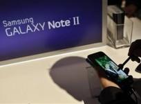 a-person-uses-the-galaxy-note-ii-after-a-news-conference-announcing-samsung039s-update-to-its-phone-tablet-hybrid-in-new-york-october-24-2012