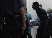 undertakers-and-hospital-staff-carry-the-body-of-the-indian-rape-victim-into-a-van-as-they-leave-mount-elizabeth-hospital-for-the-morgue-in-singapore