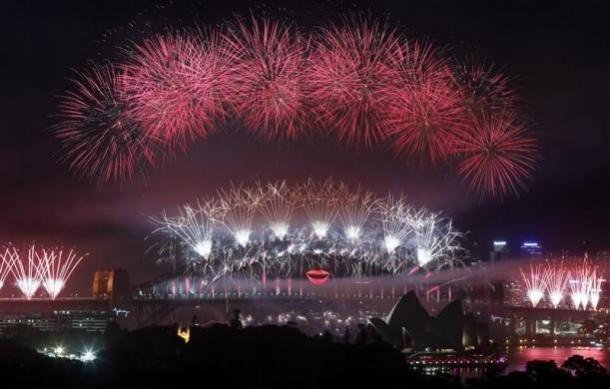 Fireworks explode over and around the Sydney Harbour Bridge and Sydney Opera House during new year celebrations. Dec. 31, 2012. REUTERS Fireworks explode over and around the Sydney Harbour Bridge and Sydney Opera House during new year celebrations