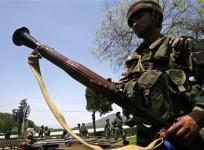 an-indian-army-soldier-displays-a-seized-rocket-propelled-grenades-launcher-rpgl-during-a-news-conference-inside-a-military-garrison-in-srinagar-april-25-2009