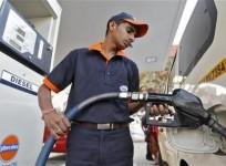 a-worker-fills-diesel-in-a-vehicle-at-a-fuel-station-in-ahmedabad-january-17-2013