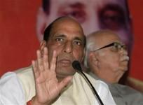 Rajnath Singh (L)