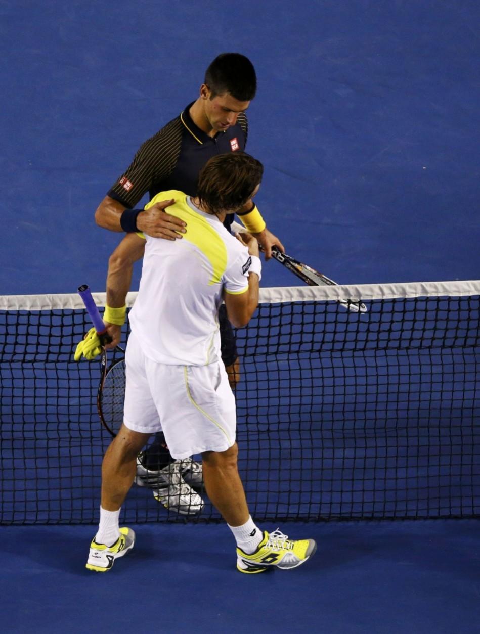 Novak Djokovic of Serbia speaks with David Ferrer of Spain after defeating him in their men's singles semi-final match at the Australian Open tennis tournament in Melbourne Novak Djokovic, David Ferrer