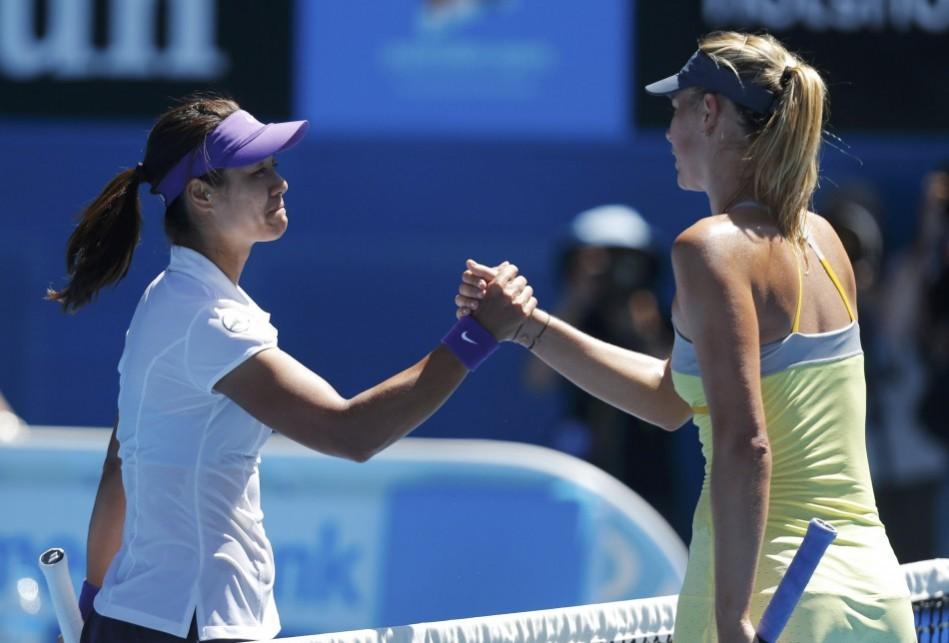 Li Na of China shakes hands with Maria Sharapova of Russia after defeating her in their women's singles semi-final match at the Australian Open tennis tournament in Melbourne Li Na, Maria Sharapova