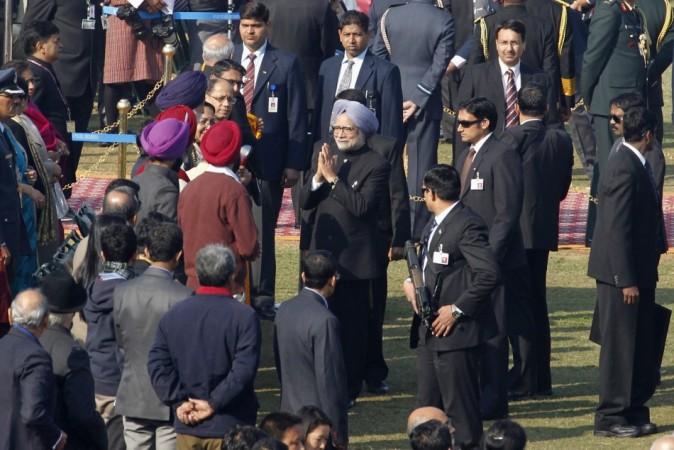 Indian Prime Minister Manmohan Singh is greeted by officials upon his arrival before the start of the Republic Day parade in New Delhi. (Reuters)