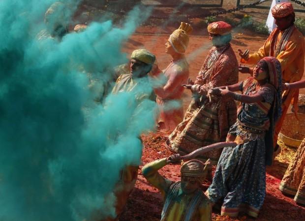 Artists in traditional attires perform during the Republic Day parade in New Delhi (Reuters)