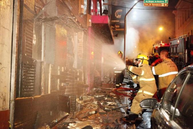 Fire-fighters try to extinguish a fire at Kiss nightclub in the southern city of Santa Maria Fire-fighters try to extinguish a fire at Kiss nightclub in the southern city of Santa Maria