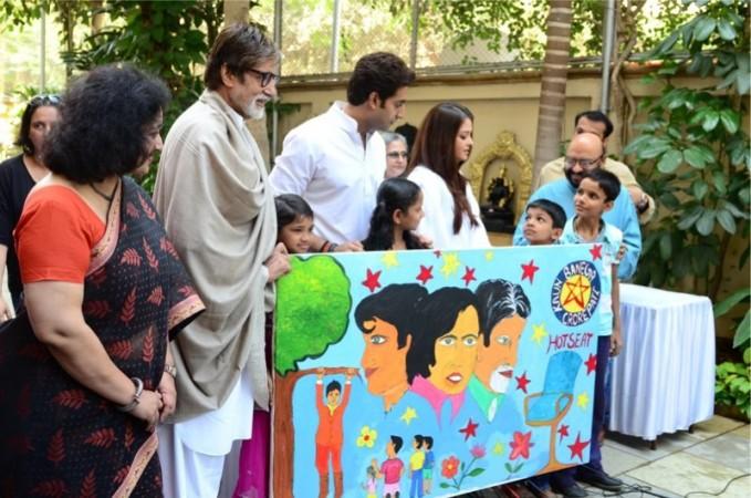 Amitabh Bachchan along with Jaya, Abhishek, Aishwarya and Govind Nihalani with kids from Plan India Amitabh Bachchan