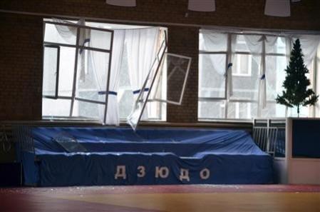 Broken windows and debris are seen inside a sports hall following sightings of a falling object in the sky in the Urals city of Chelyabinsk February 15, 2013. Broken windows and debris are seen inside a sports hall following sightings of a falling object in the sky in the Urals city of Chelyabinsk February 15, 2013.