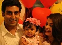 aaradhya-with-her-parents-on-her-1st-birthday-16-nov-2012