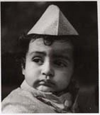 Amitabh Bachchan when he was very little.